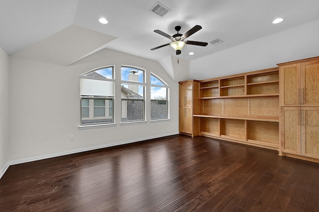 unfurnished living room featuring ceiling fan, lofted ceiling, and dark hardwood / wood-style flooring