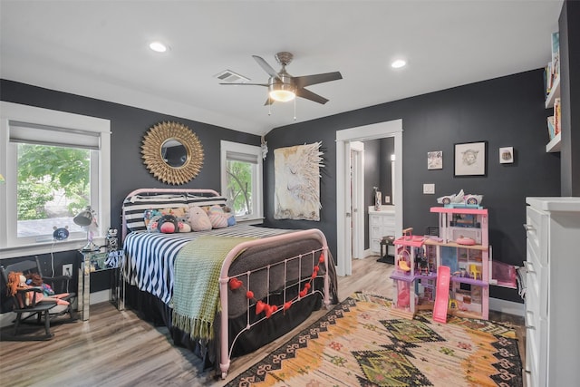 bedroom featuring ceiling fan, light wood-style flooring, recessed lighting, visible vents, and baseboards