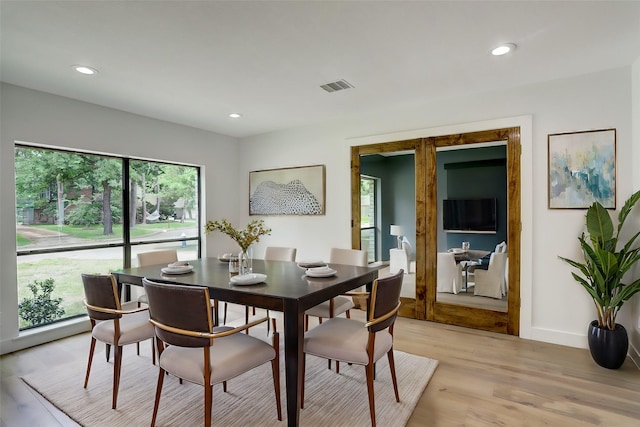 dining area featuring light hardwood / wood-style flooring