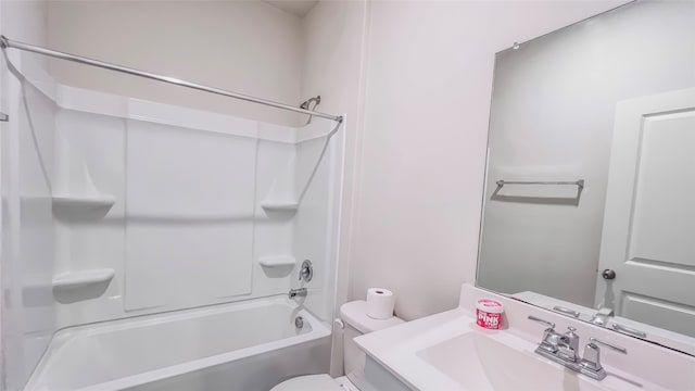 full bathroom with vanity, bathtub / shower combination, and toilet