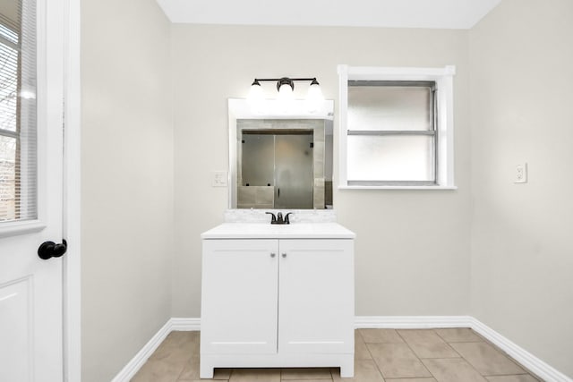 bathroom featuring vanity and tile patterned flooring