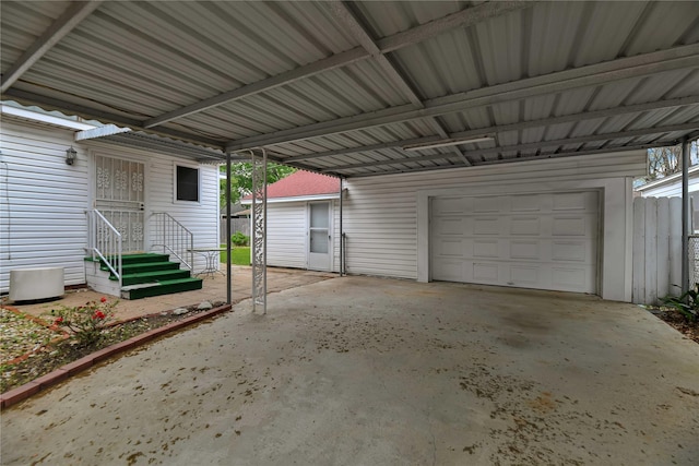 garage with a carport