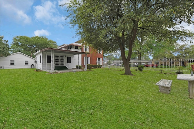 view of yard with fence