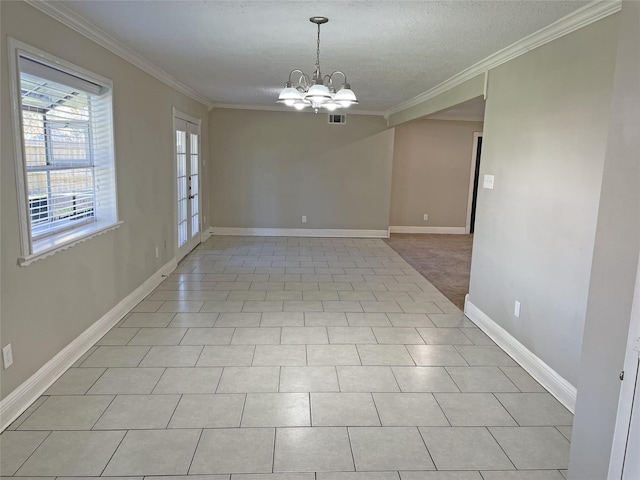 tiled empty room with an inviting chandelier and ornamental molding