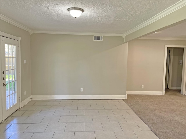 spare room with french doors, crown molding, light carpet, and a textured ceiling