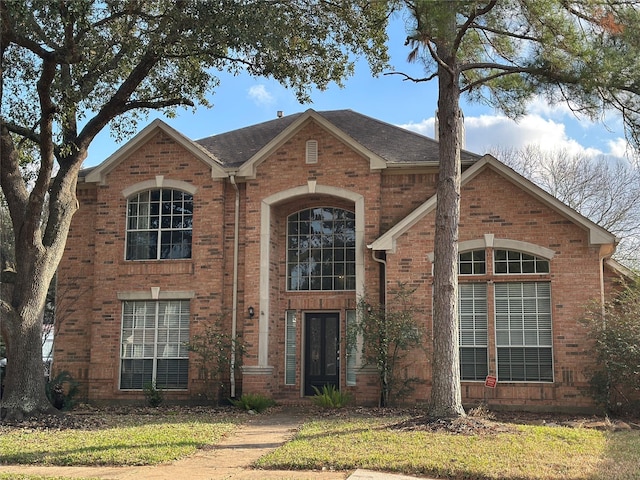 view of front property with a front yard