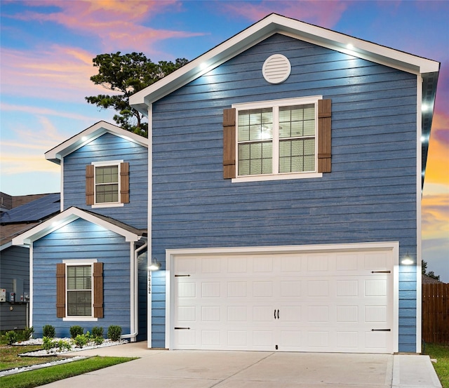 front facade with a garage