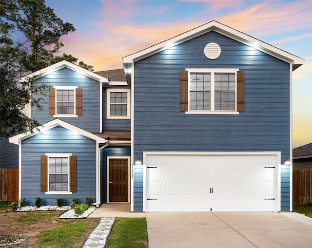 view of property with a garage