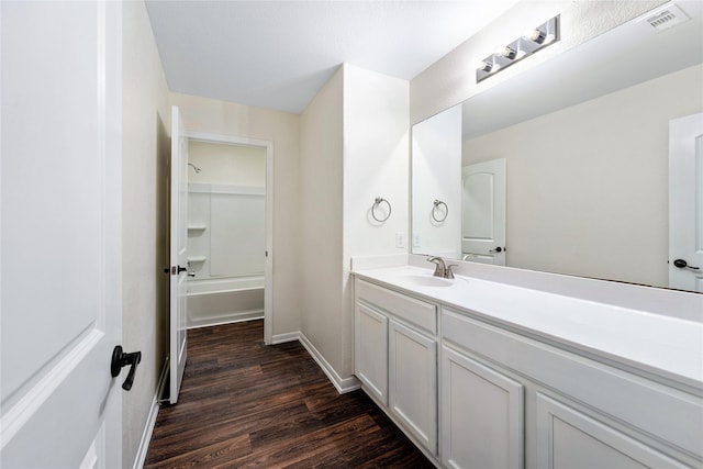 bathroom with vanity and wood-type flooring