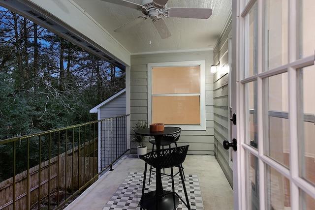 balcony featuring ceiling fan