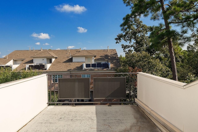 view of patio with a balcony