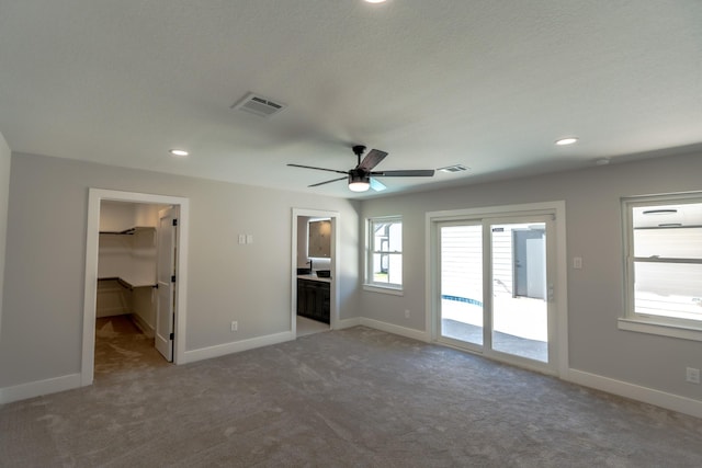 interior space featuring ceiling fan