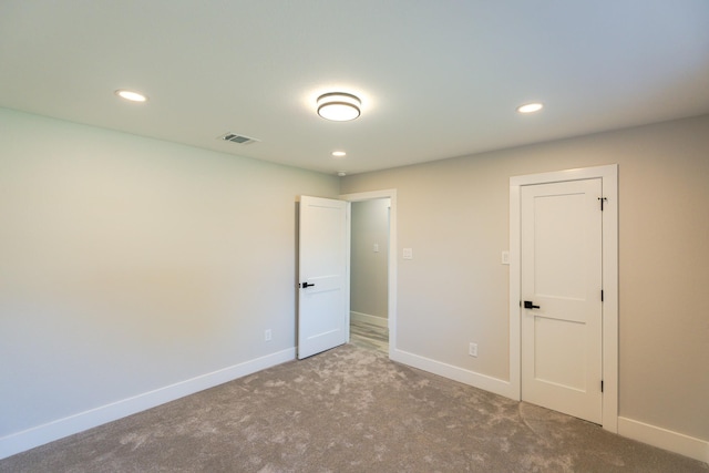 view of carpeted spare room