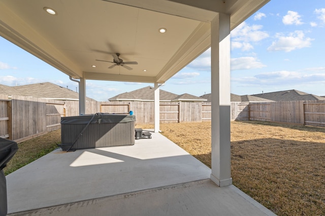 view of patio / terrace featuring ceiling fan