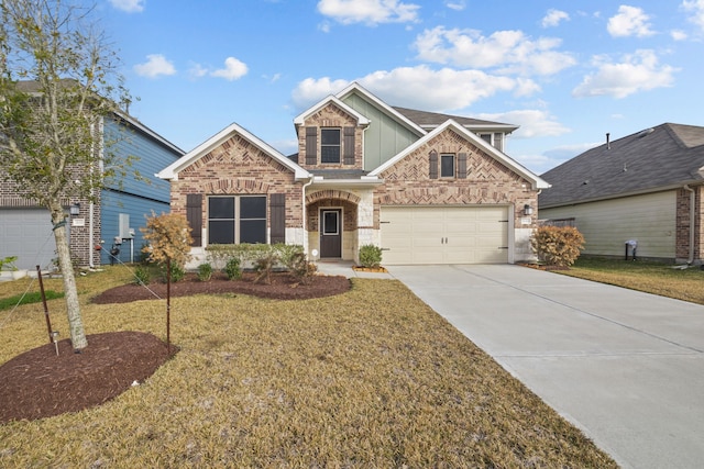 craftsman-style house with a garage and a front lawn