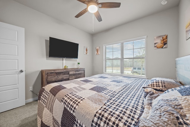 bedroom with light carpet and ceiling fan