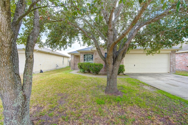 ranch-style house with a garage and a front yard