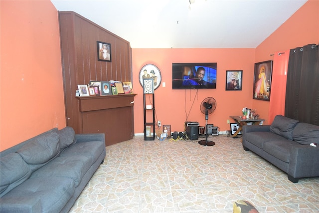 living room with lofted ceiling