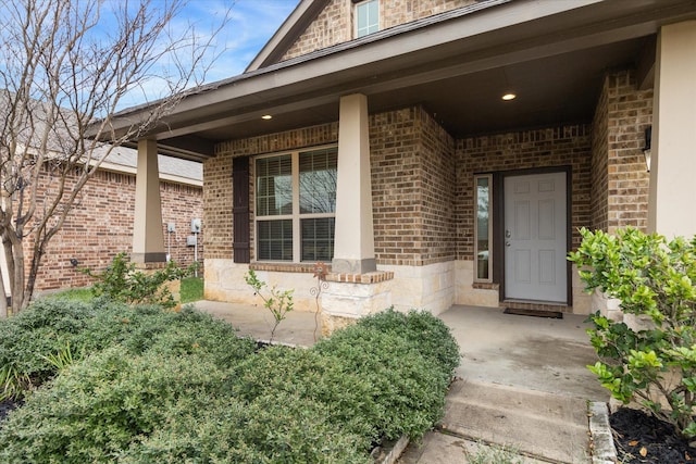 doorway to property featuring a porch