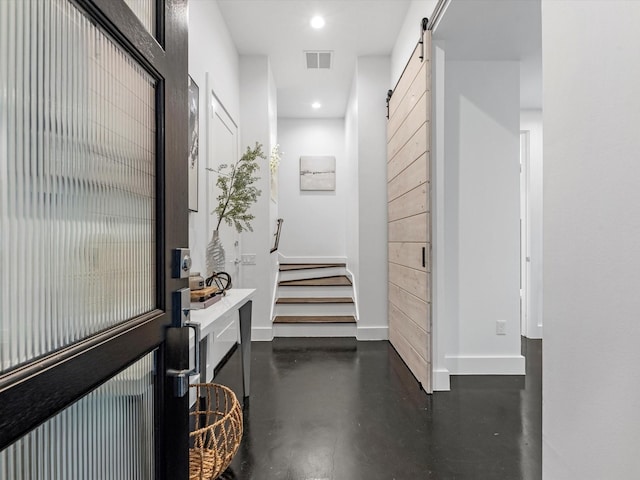 interior space with a barn door