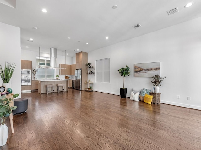 living room featuring dark hardwood / wood-style floors