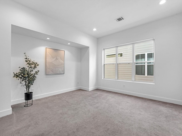 view of carpeted spare room