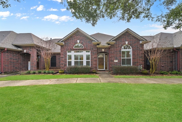 view of front of property with a front lawn