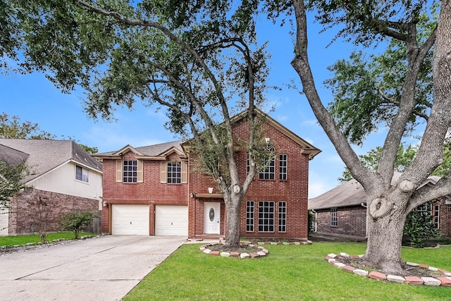 view of front of property with a garage and a front yard