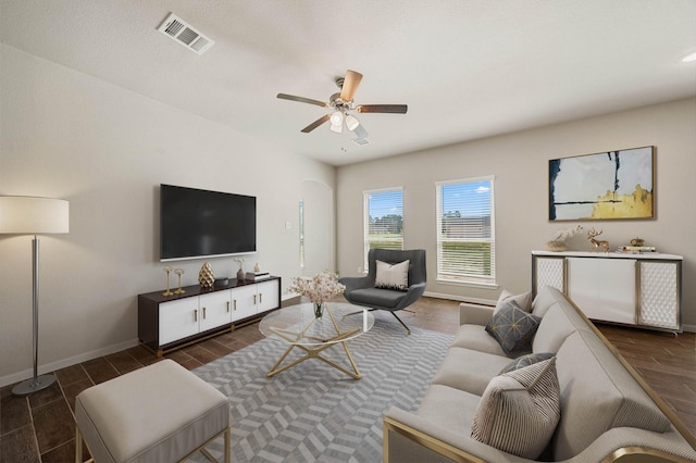 living room featuring ceiling fan