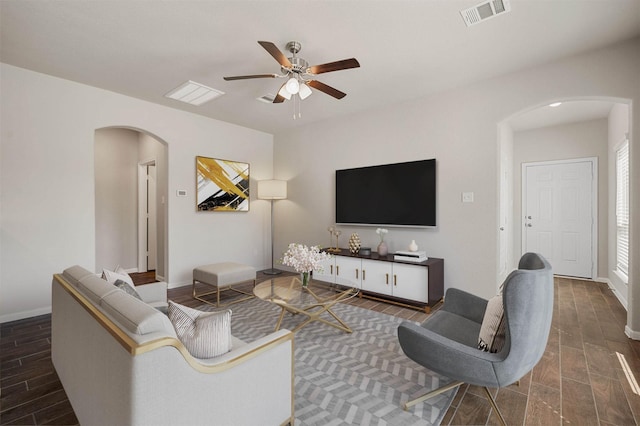 living room with ceiling fan