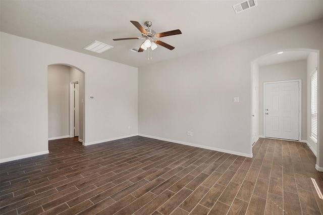 unfurnished room with dark wood-type flooring and ceiling fan