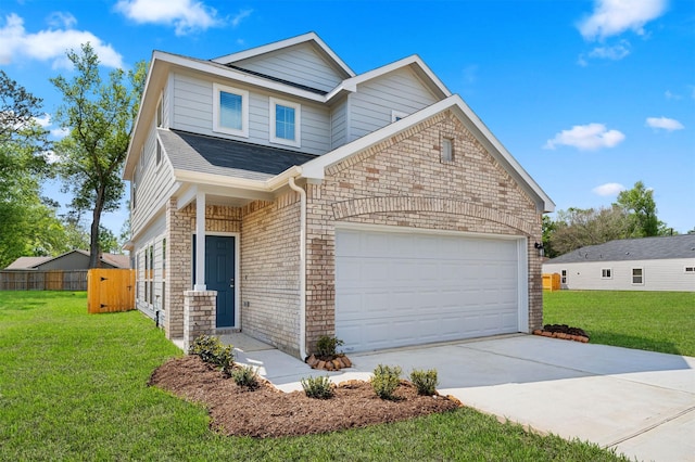 view of front of house with a garage and a front yard