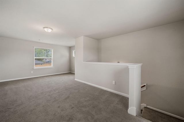 empty room featuring carpet flooring