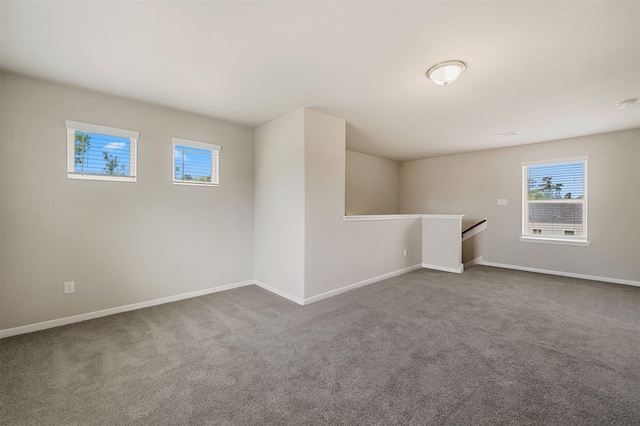 unfurnished room with carpet