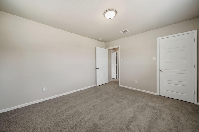 view of carpeted spare room