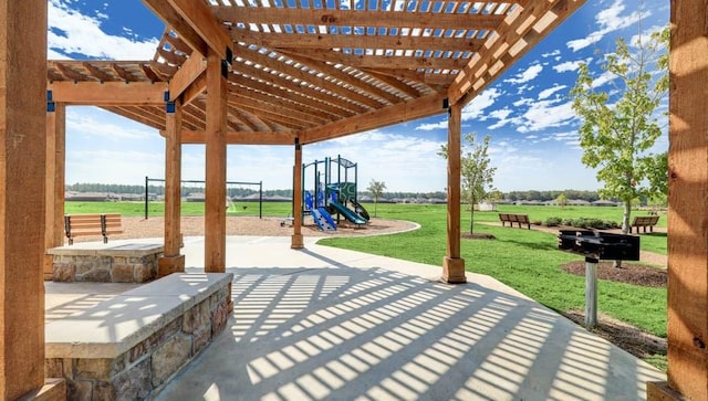 view of patio / terrace featuring a playground and a pergola