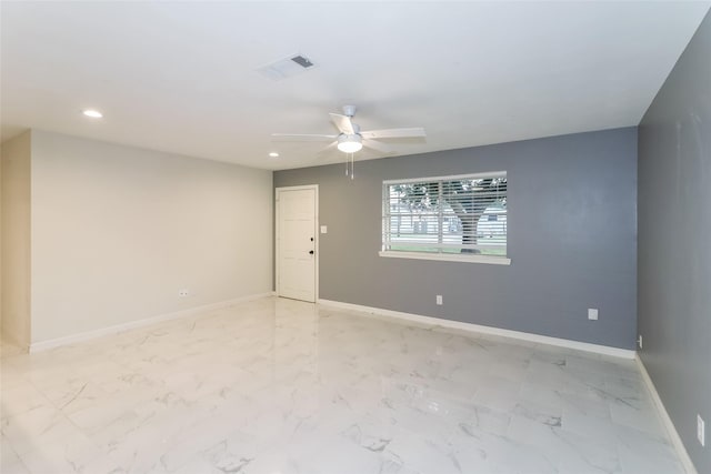 spare room featuring ceiling fan