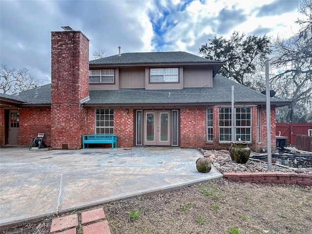 back of house featuring a patio area