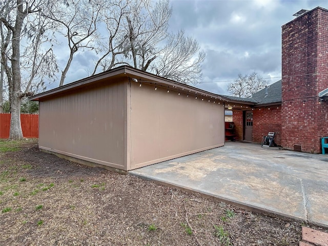 back of property with a patio area