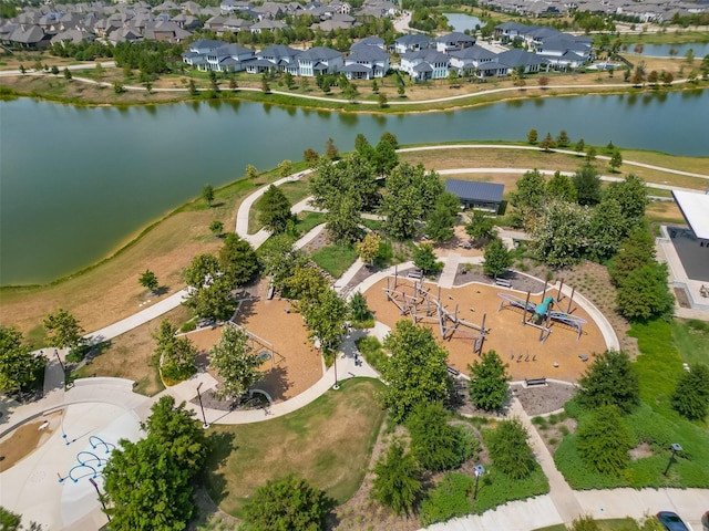 view of property location with nearby suburban area and a nearby body of water
