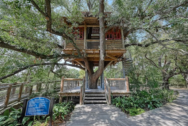 view of home's community with a wooden deck