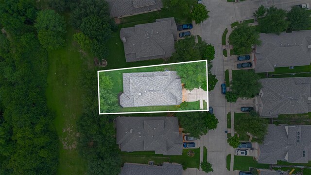 aerial view of property's location featuring nearby suburban area and property parcel outlined