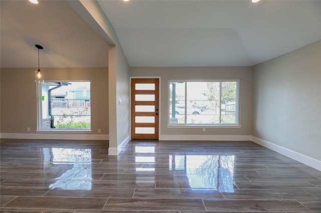 214 Canadian St, Houston, TX 77009 - foyer entrance with recessed lighting, baseboards, lofted ceiling, and dark wood-style floors