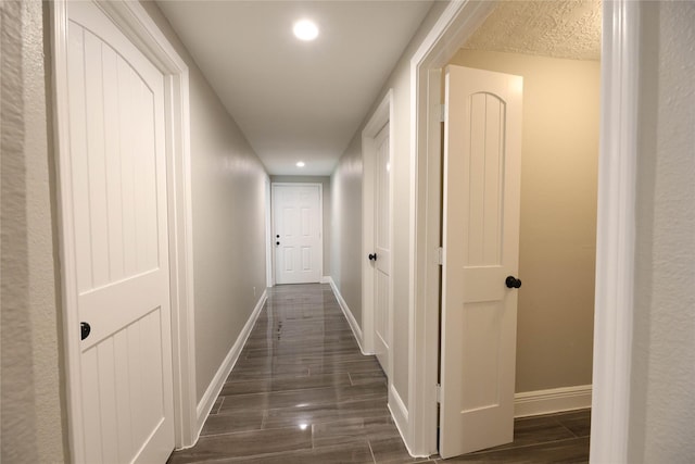214 Canadian St, Houston, TX 77009 - corridor with baseboards, recessed lighting, and dark wood-style floors