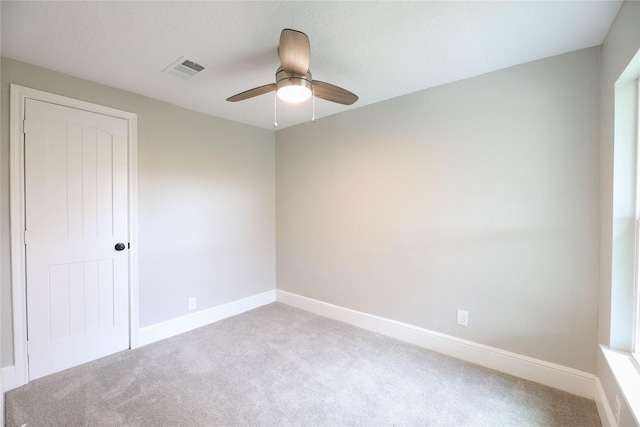214 Canadian St, Houston, TX 77009 - carpeted spare room featuring visible vents, ceiling fan, and baseboards