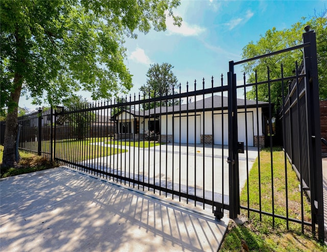 214 Canadian St, Houston, TX 77009 - view of gate with a yard and fence private yard