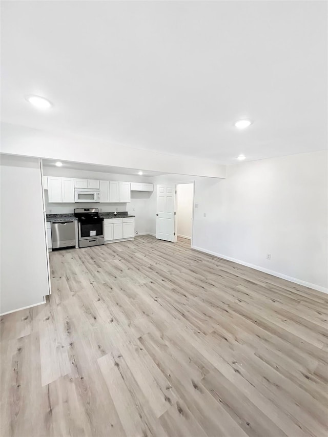 unfurnished living room with light hardwood / wood-style floors