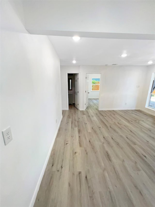 unfurnished room featuring light hardwood / wood-style flooring