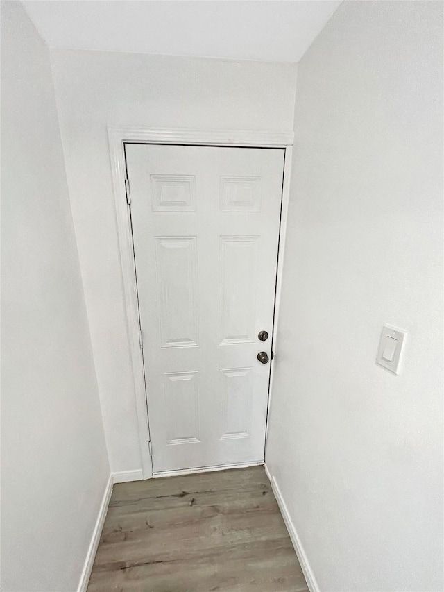 doorway featuring hardwood / wood-style floors