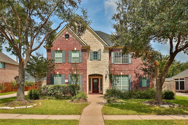 view of front of home with a front lawn